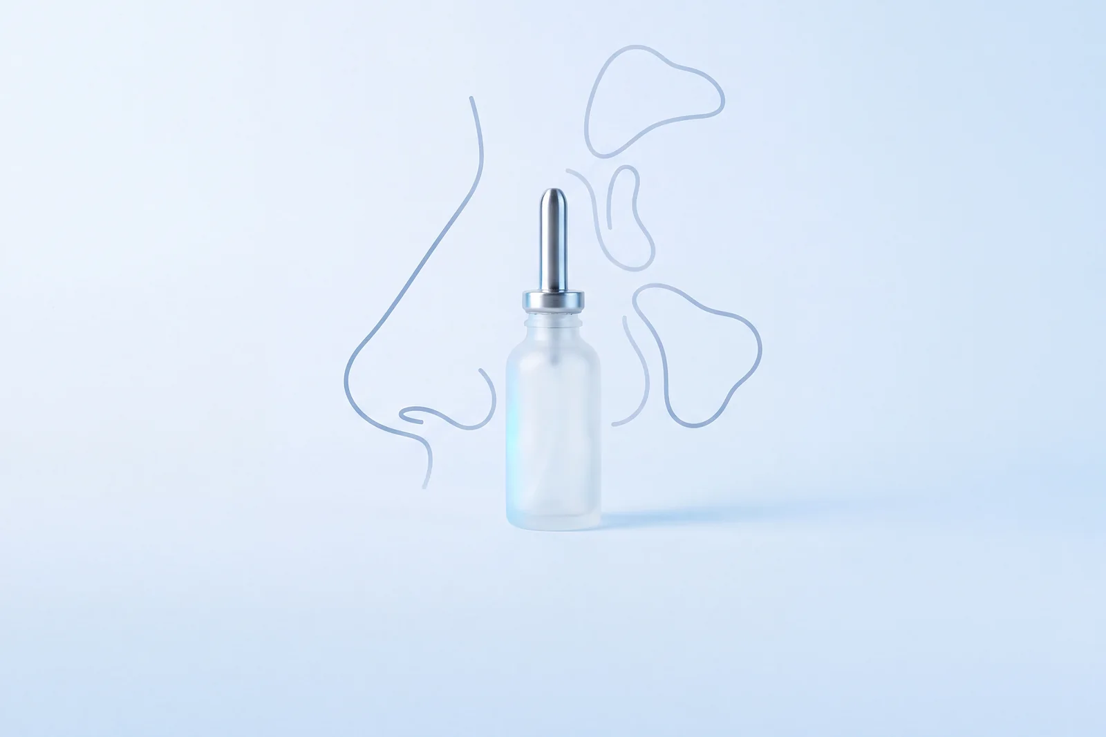 An unlabelled glass nasal bottle, with line-drawn nose and sinus outlines behind it